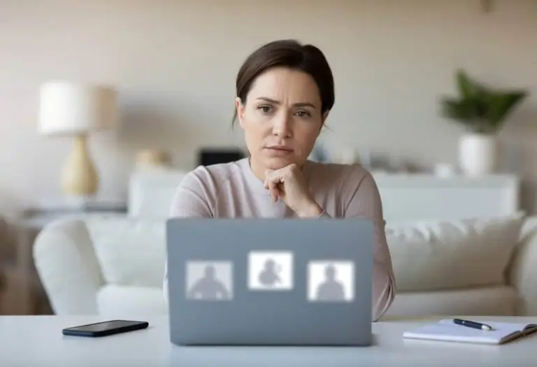 A woman behind a laptop