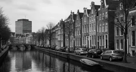 Dutch canal with historic buildings and bridge