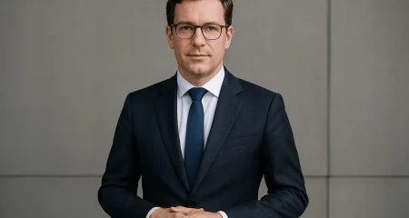 Smartly dressed man in formal attire.